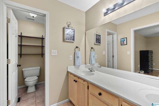 246 Park Place Way, Alabaster, AL 35007 - full bath featuring double vanity, toilet, tile patterned flooring, and baseboards