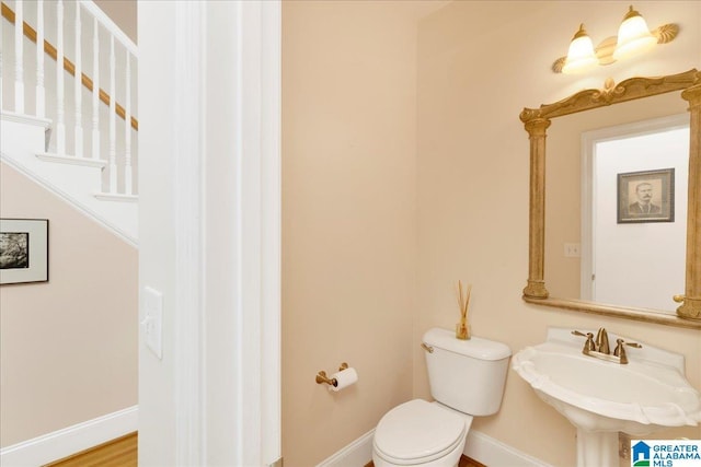 1222 Eagle Park Rd, Birmingham, AL 35242 - half bath with baseboards, toilet, and a sink