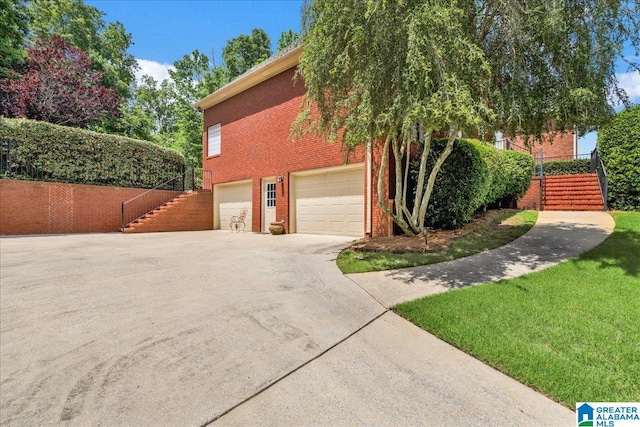 1222 Eagle Park Rd, Birmingham, AL 35242 - view of front of property with stairs, driveway, brick siding, and an attached garage