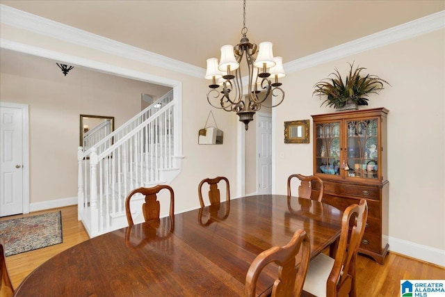 1222 Eagle Park Rd, Birmingham, AL 35242 - dining room with a chandelier, ornamental molding, light wood-style floors, and baseboards