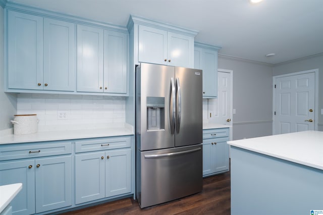 3504 William And Mary Rd, Hoover, AL 35216 - kitchen with stainless steel fridge, decorative backsplash, dark wood-style floors, light countertops, and ornamental molding