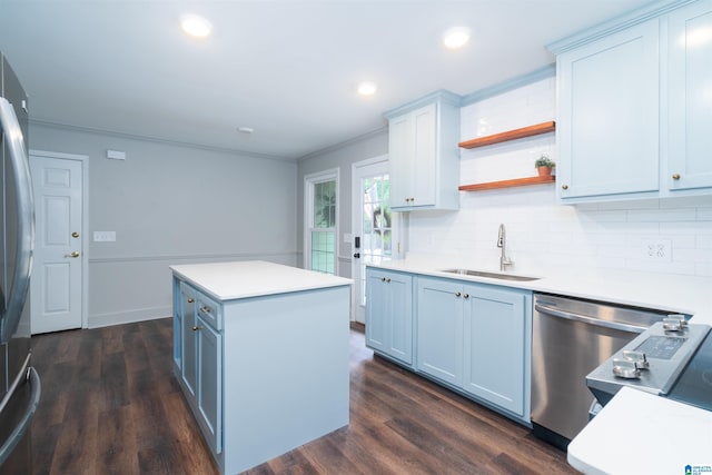 3504 William And Mary Rd, Hoover, AL 35216 - kitchen with a sink, stainless steel appliances, a center island, tasteful backsplash, and dark wood-style flooring