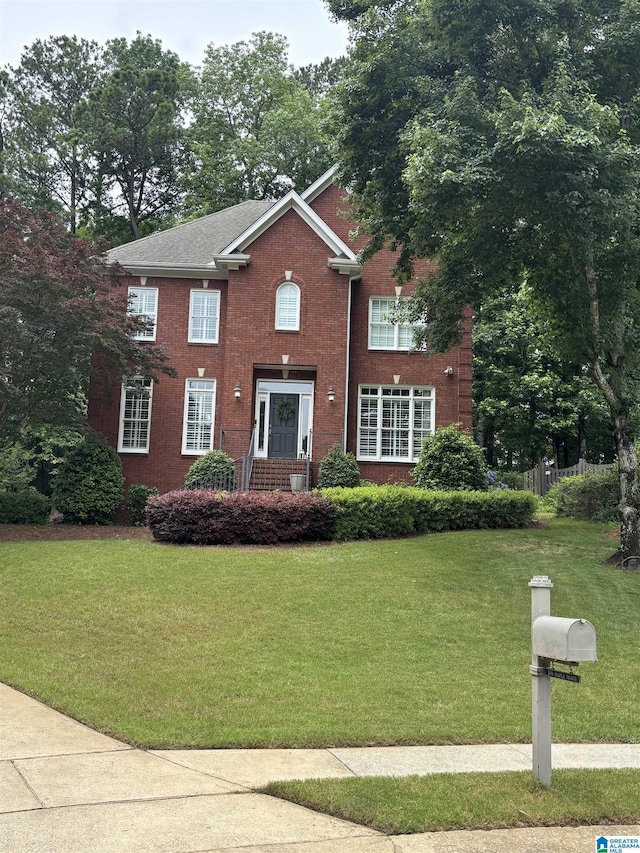 208 Maple Trce, Hoover, AL 35244 - colonial house featuring a front yard and brick siding
