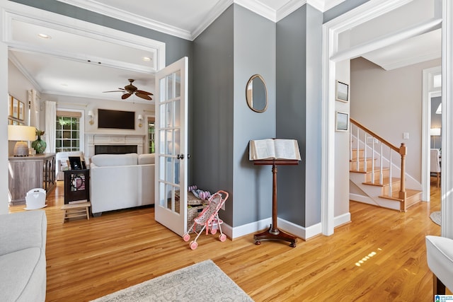 208 Maple Trce, Hoover, AL 35244 - hallway with wood finished floors, stairway, crown molding, baseboards, and recessed lighting