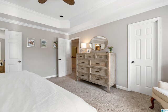 208 Maple Trce, Hoover, AL 35244 - carpeted bedroom featuring crown molding, baseboards, a tray ceiling, and a ceiling fan