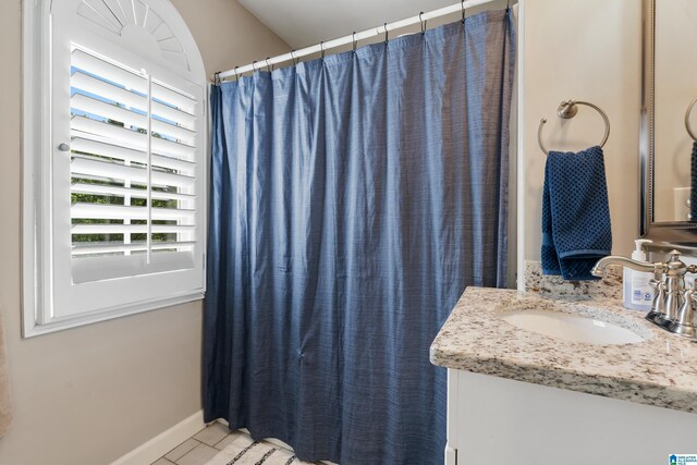 208 Maple Trce, Hoover, AL 35244 - bathroom featuring vanity, curtained shower, and baseboards