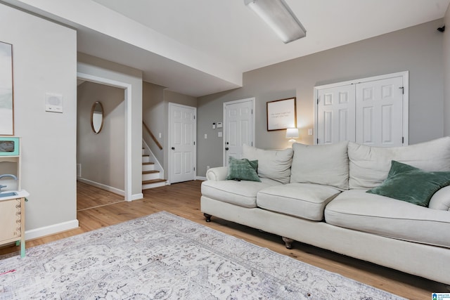 208 Maple Trce, Hoover, AL 35244 - living area with light wood finished floors, stairway, and baseboards