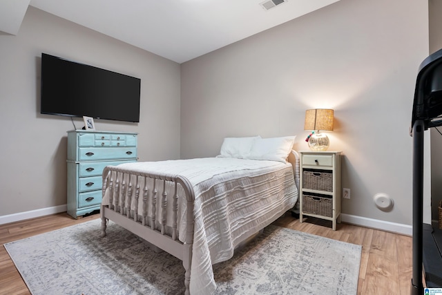 208 Maple Trce, Hoover, AL 35244 - bedroom with light wood-style flooring and baseboards