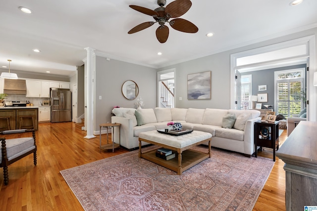 208 Maple Trce, Hoover, AL 35244 - living room with a ceiling fan, recessed lighting, light wood-style flooring, crown molding, and baseboards