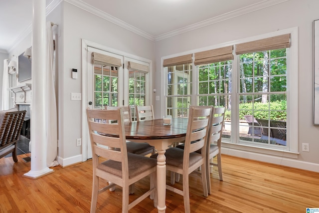 208 Maple Trce, Hoover, AL 35244 - dining room featuring baseboards, light wood-style flooring, and crown molding