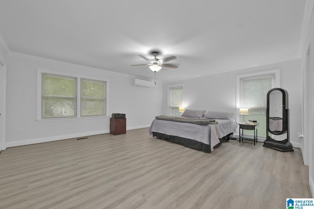 2028 Moncrief Rd, Gardendale, AL 35071 - bedroom with an AC wall unit, wood finished floors, ornamental molding, baseboards, and ceiling fan