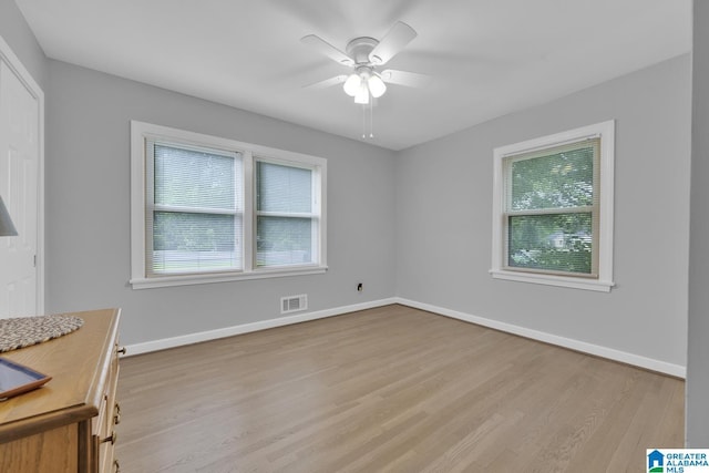 2028 Moncrief Rd, Gardendale, AL 35071 - unfurnished room with wood finished floors, a ceiling fan, and baseboards