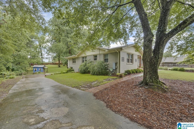 2028 Moncrief Rd, Gardendale, AL 35071 - view of front of property with a front lawn and concrete driveway