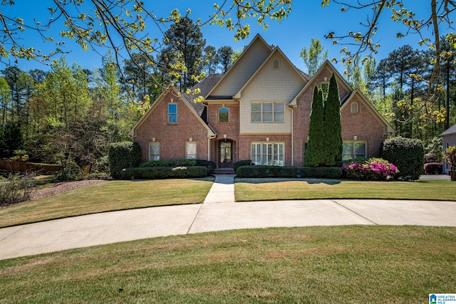 386 N Lake Rd, Birmingham, AL 35242 - view of front of home with brick siding and a front lawn