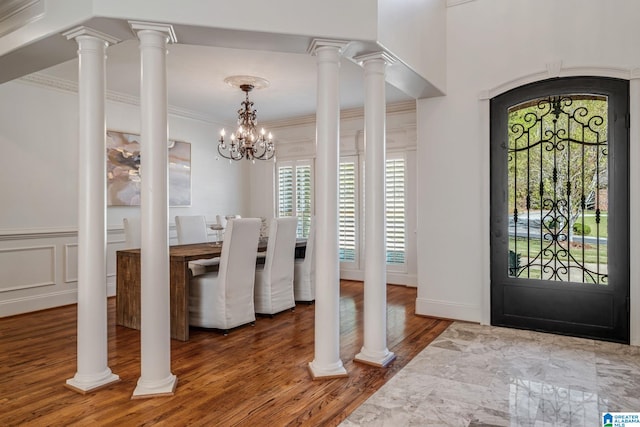 386 N Lake Rd, Birmingham, AL 35242 - entrance foyer with healthy amount of natural light, a chandelier, wood finished floors, and crown molding