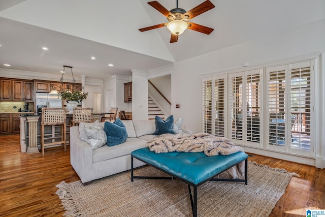 386 N Lake Rd, Birmingham, AL 35242 - living area featuring stairs, wood finished floors, ceiling fan, recessed lighting, and high vaulted ceiling