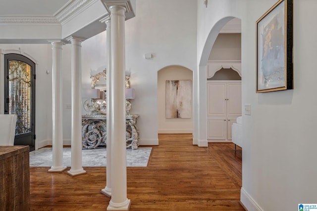 386 N Lake Rd, Birmingham, AL 35242 - foyer with wood finished floors, crown molding, arched walkways, and baseboards