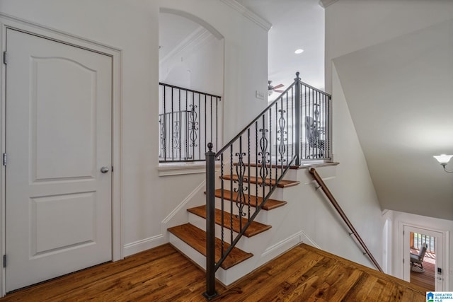 386 N Lake Rd, Birmingham, AL 35242 - stairway featuring wood finished floors, arched walkways, baseboards, and ceiling fan