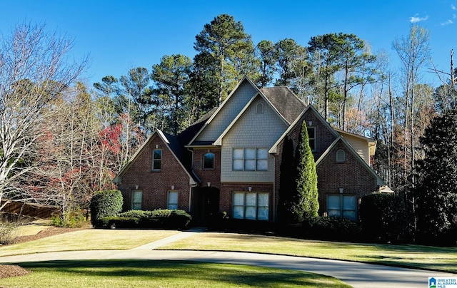386 N Lake Rd, Birmingham, AL 35242 - view of front of house with a front lawn and brick siding