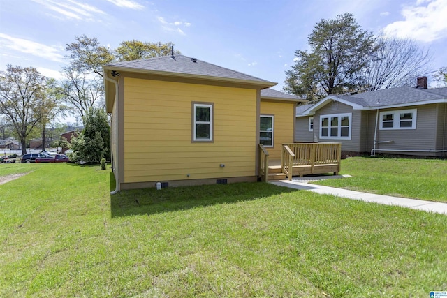 906 6th Ave W, Birmingham, AL 35204 - back of property featuring a lawn and a deck