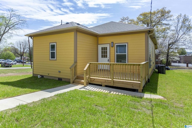 906 6th Ave W, Birmingham, AL 35204 - back of property with a deck, a yard, crawl space, and central air condition unit