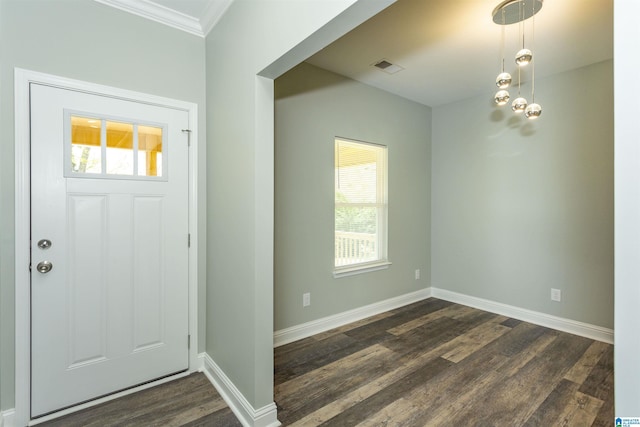 906 6th Ave W, Birmingham, AL 35204 - entryway featuring ornamental molding, dark wood-style floors, and baseboards