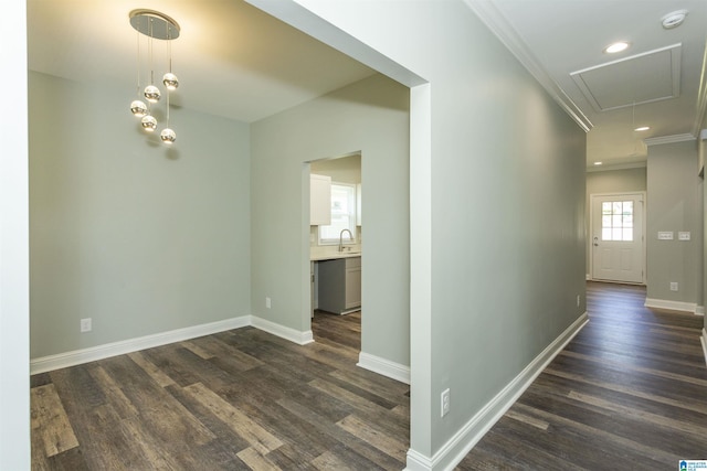 906 6th Ave W, Birmingham, AL 35204 - corridor featuring a sink, attic access, crown molding, dark wood finished floors, and baseboards