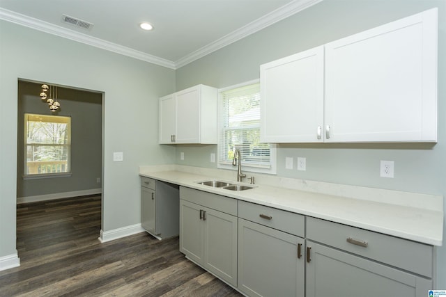 906 6th Ave W, Birmingham, AL 35204 - kitchen featuring a sink, crown molding, dark wood finished floors, baseboards, and light countertops