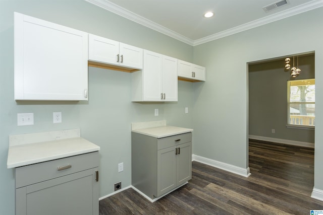 906 6th Ave W, Birmingham, AL 35204 - kitchen featuring ornamental molding, dark wood finished floors, baseboards, recessed lighting, and light countertops