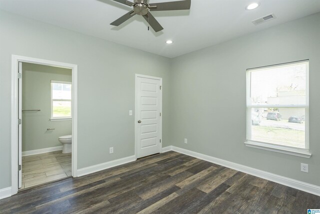 906 6th Ave W, Birmingham, AL 35204 - unfurnished bedroom with dark wood-style flooring, baseboards, recessed lighting, ensuite bath, and ceiling fan