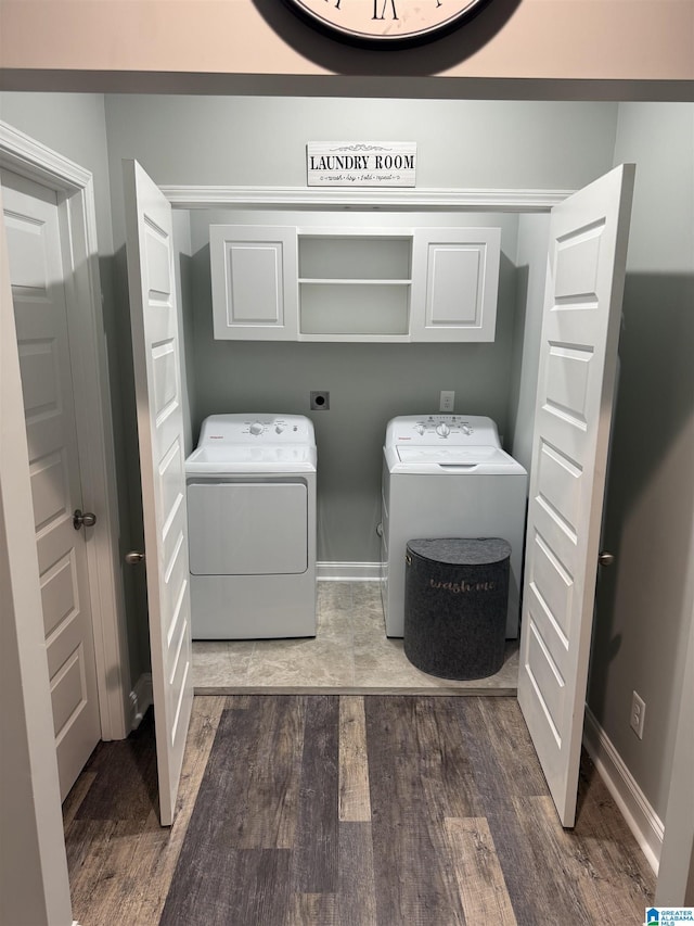 906 6th Ave W, Birmingham, AL 35204 - laundry room featuring cabinet space, washer and dryer, wood finished floors, and baseboards