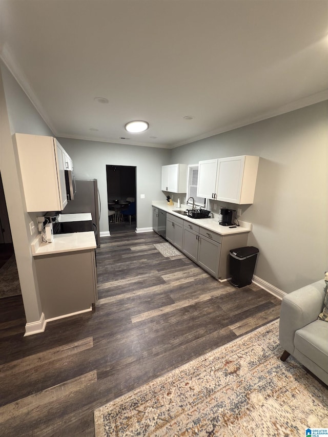 906 6th Ave W, Birmingham, AL 35204 - kitchen with baseboards, dishwasher, light countertops, dark wood-style floors, and gray cabinets