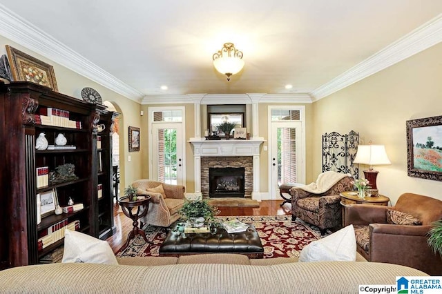 100 Jeff View Ct, Harvest, AL 35749 - living area featuring wood finished floors, ornamental molding, a fireplace, and recessed lighting