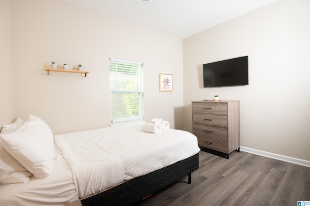 539 63rd St S, Birmingham, AL 35212 - bedroom featuring wood finished floors and baseboards
