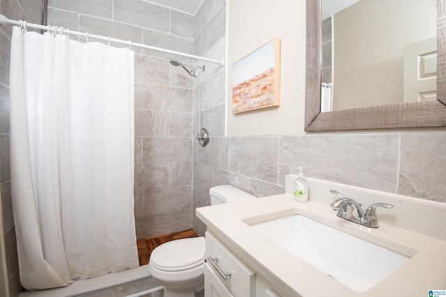 539 63rd St S, Birmingham, AL 35212 - full bath with toilet, tile walls, vanity, and tiled shower