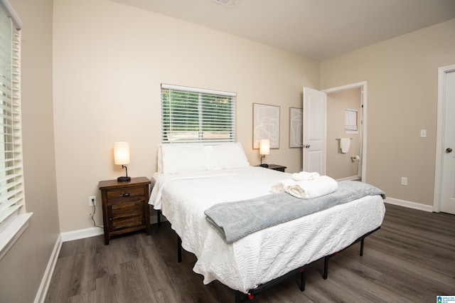539 63rd St S, Birmingham, AL 35212 - bedroom featuring dark wood-style floors and baseboards