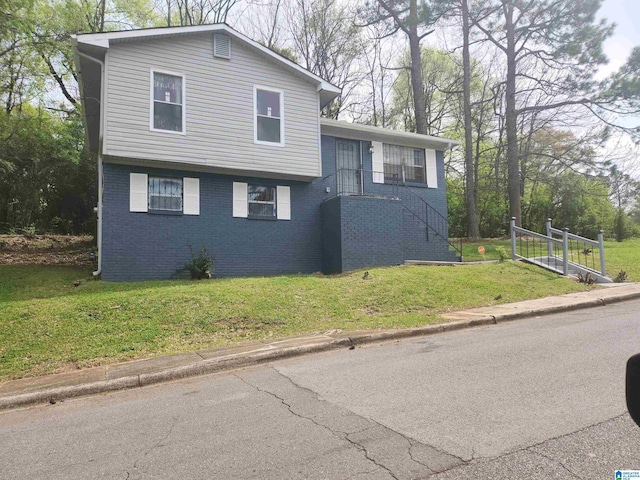 2125 Henry Crumpton Dr, Birmingham, AL 35211 - split level home featuring brick siding and a front yard