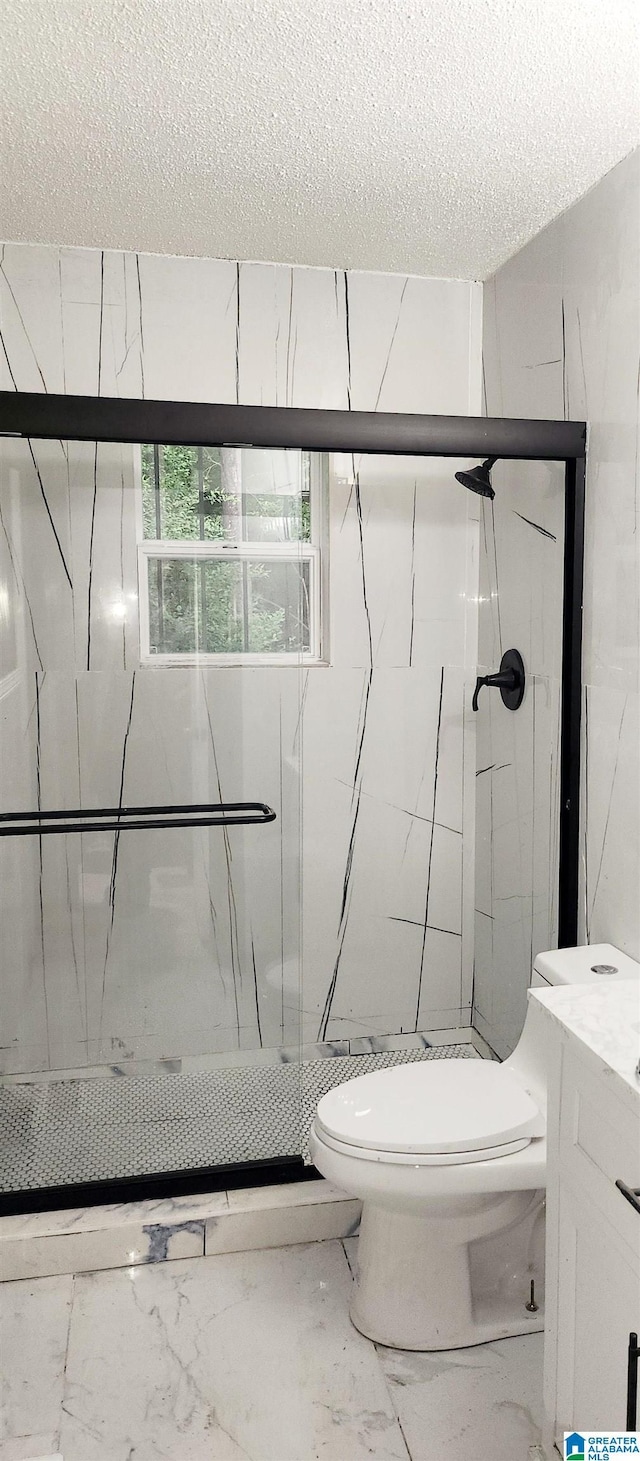2125 Henry Crumpton Dr, Birmingham, AL 35211 - full bath featuring toilet, a marble finish shower, marble finish floors, a textured ceiling, and vanity