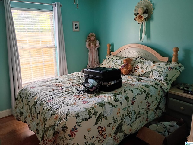 115 Clover St, Odenville, AL 35120 - bedroom with wood finished floors and baseboards