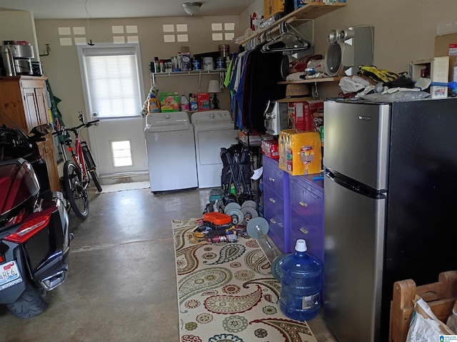 115 Clover St, Odenville, AL 35120 - garage featuring freestanding refrigerator and washing machine and dryer