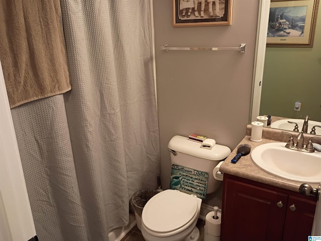 115 Clover St, Odenville, AL 35120 - bathroom with vanity, toilet, curtained shower, and tile patterned floors