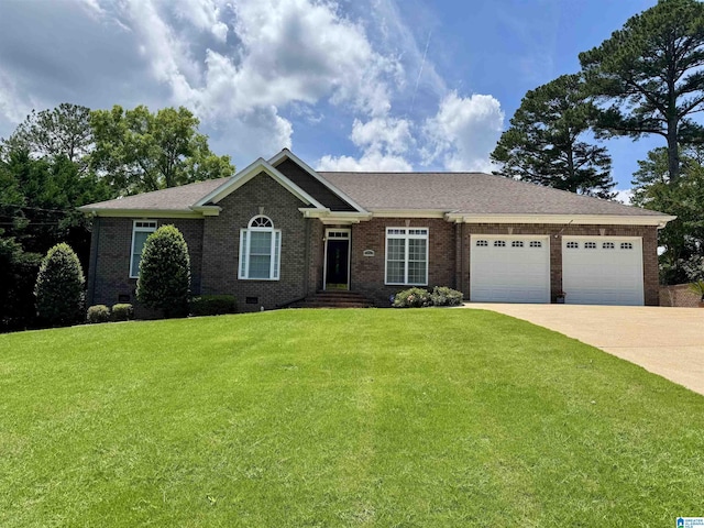 101 Mill Rd, Springville, AL 35146 - view of front facade featuring brick siding, a garage, concrete driveway, a front lawn, and crawl space