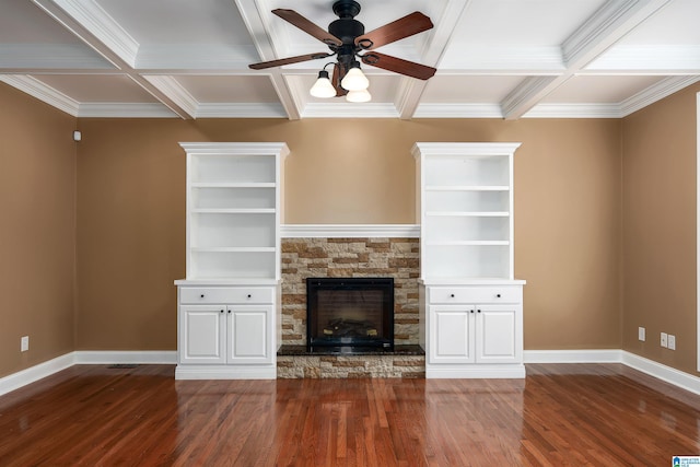 101 Mill Rd, Springville, AL 35146 - unfurnished living room featuring coffered ceiling, a ceiling fan, wood finished floors, a stone fireplace, and crown molding