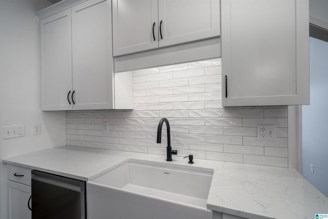 429 Eaton Rd, Hoover, AL 35242 - kitchen featuring a sink, backsplash, light stone counters, white cabinetry, and stainless steel dishwasher