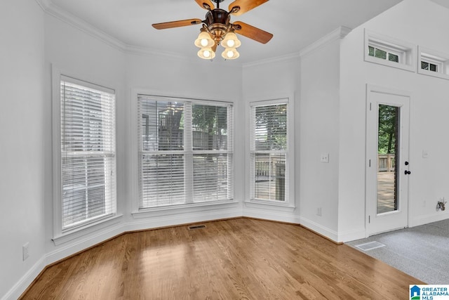4728 Red Leaf Cir, Hoover, AL 35226 - unfurnished dining area featuring plenty of natural light, ceiling fan, baseboards, ornamental molding, and wood finished floors