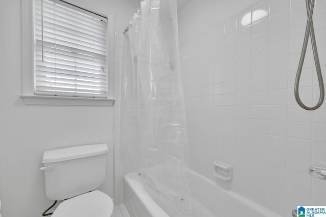 4728 Red Leaf Cir, Hoover, AL 35226 - bathroom featuring shower / bathtub combination with curtain and toilet