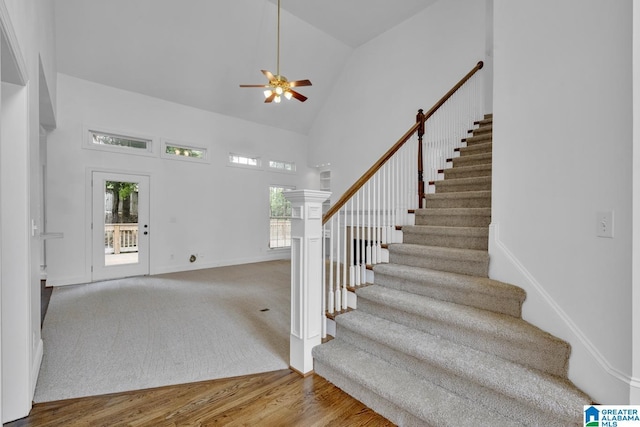 4728 Red Leaf Cir, Hoover, AL 35226 - foyer entrance with high vaulted ceiling, stairway, ceiling fan, and healthy amount of natural light