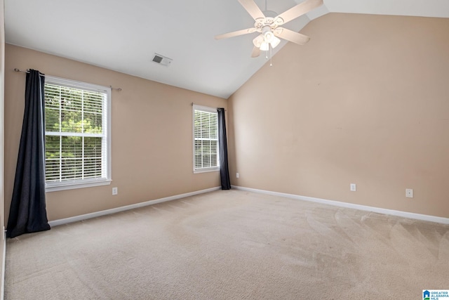 538 Forest Lakes Dr, Sterrett, AL 35147 - empty room featuring lofted ceiling, baseboards, ceiling fan, carpet, and plenty of natural light