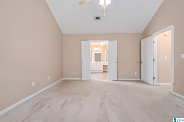 538 Forest Lakes Dr, Sterrett, AL 35147 - unfurnished bedroom featuring light carpet, baseboards, connected bathroom, lofted ceiling, and ceiling fan