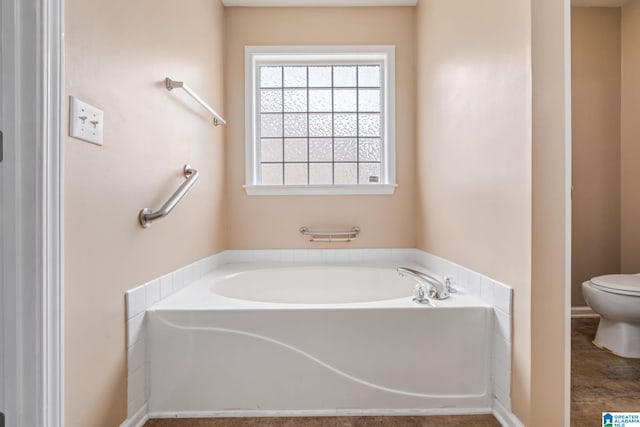 538 Forest Lakes Dr, Sterrett, AL 35147 - bathroom featuring toilet and a garden tub